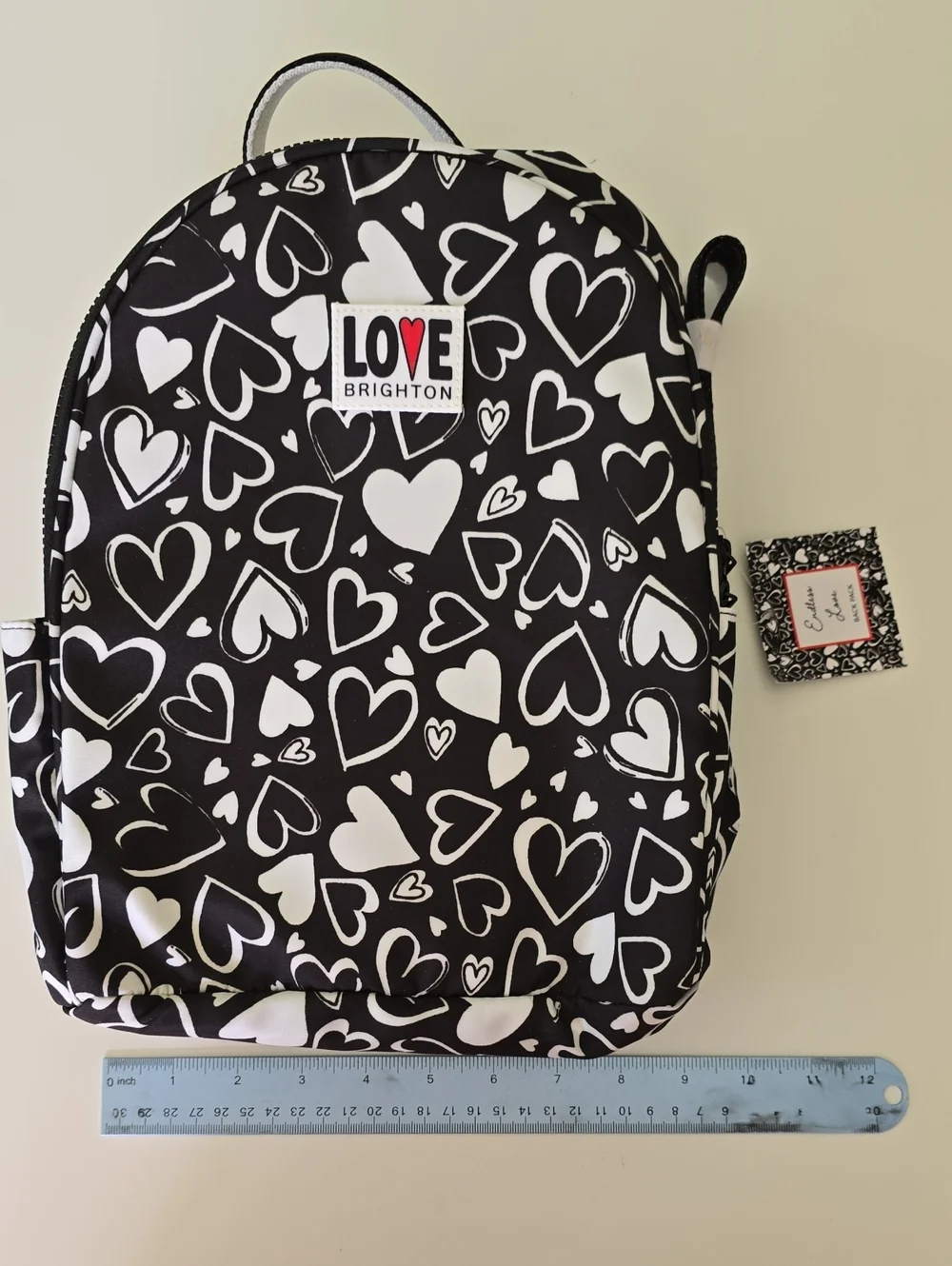 Brighton Kids Endless Love Back Pack. Black With White Heart Prints.